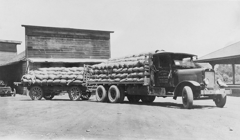 Historic photo of an early Critchley truck loaded with sacks